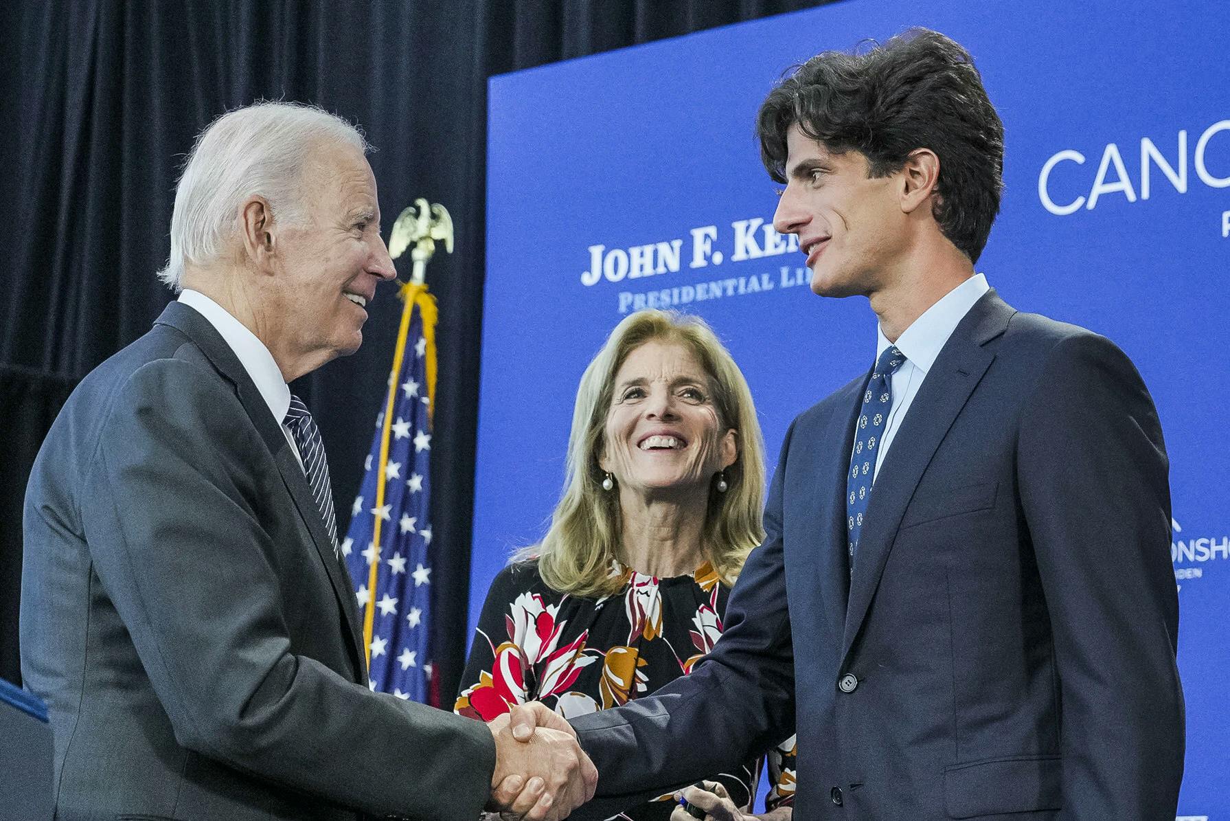 President Joe Biden greets Ambassador Caroline Kennedy and her son John "Jack" Schlossberg after delivering remarks on the Cancer Moonshot, Monday, September 12, 2022, at the John F. Kennedy Presidential Library and Museum in Boston. Official White House photo by Adam Schultz, Public domain, via Wikimedia Commons.